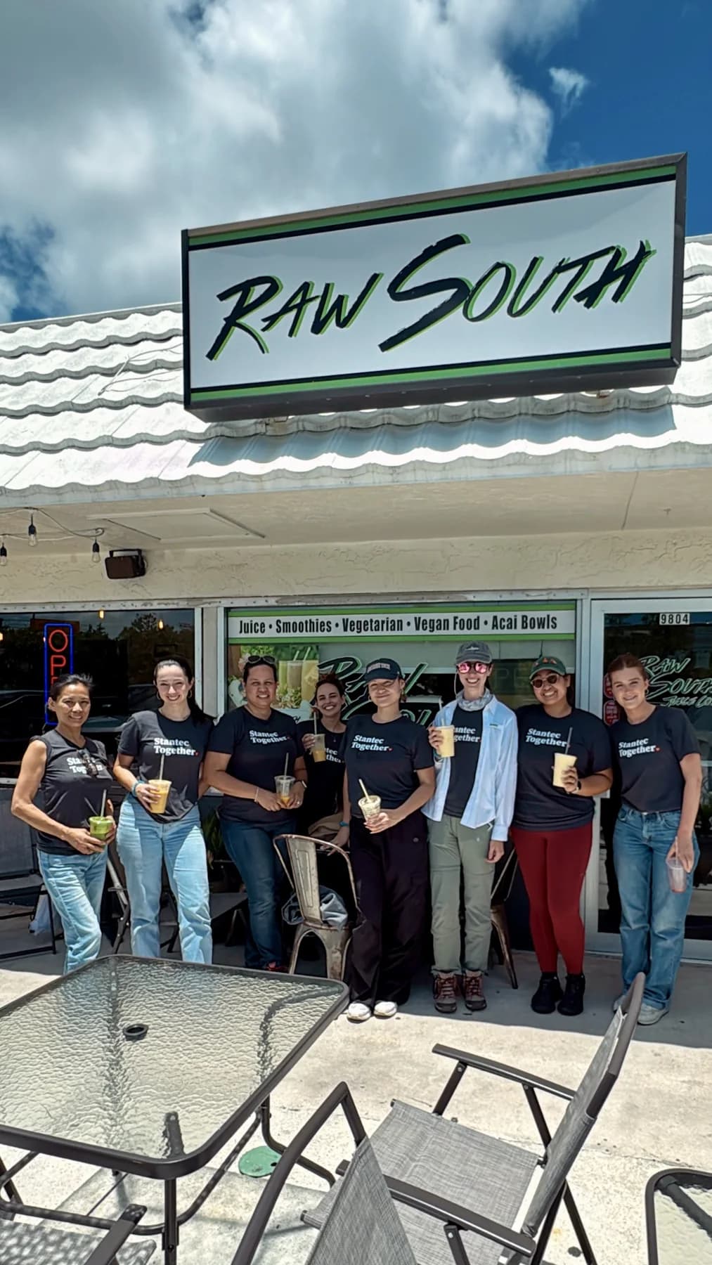 Raw South hospitality moment with fresh food and a welcoming café setting.